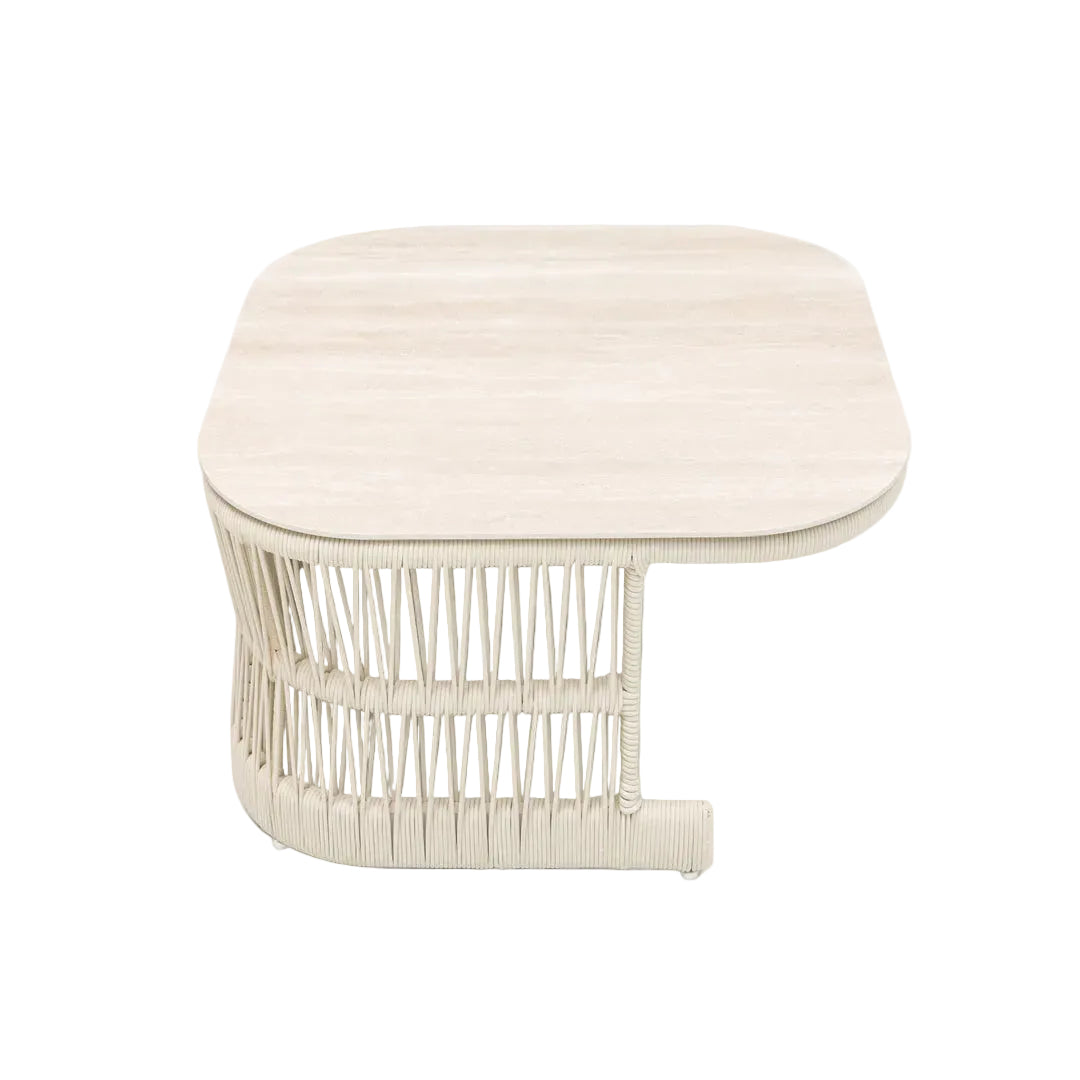 Beige ottoman with woven design on a white background